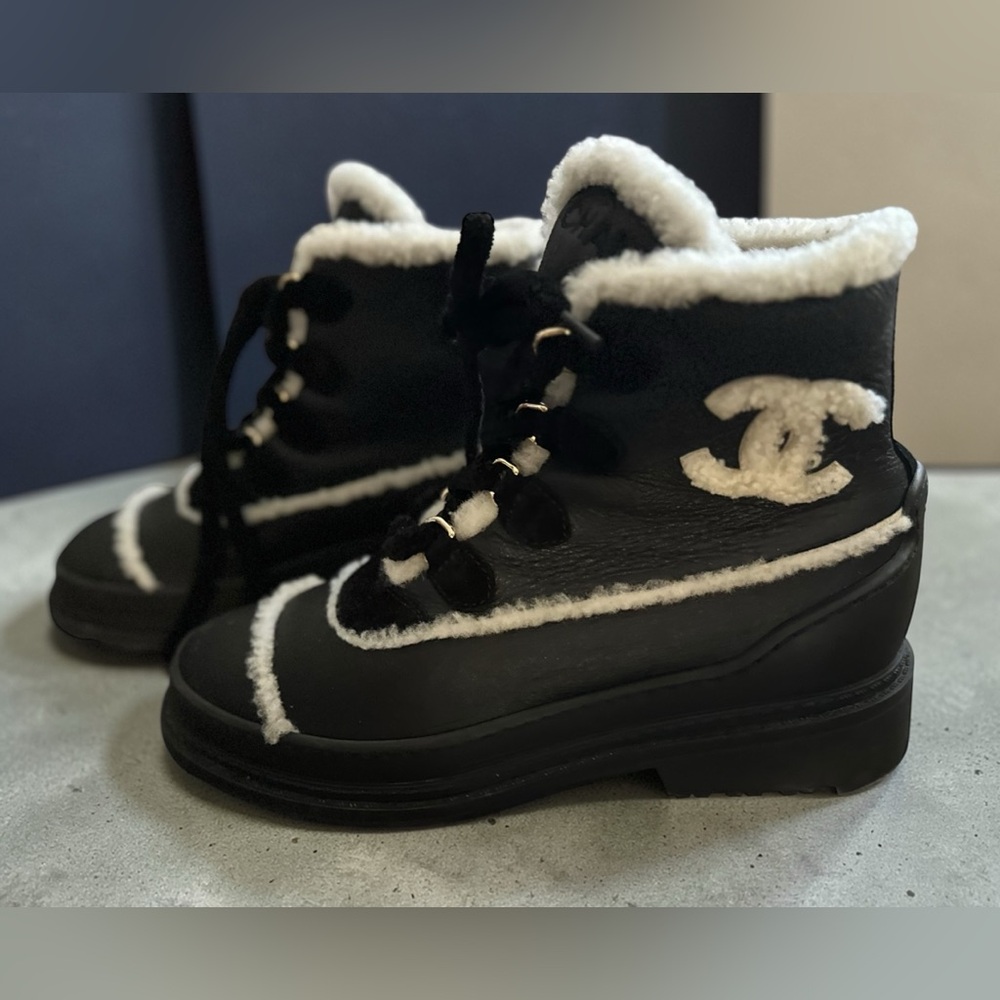 CHANEL Black Calfskin & White Shearling-Trim Lace-Up Sherpa Lined Combat Boots - Picture 1 of 15